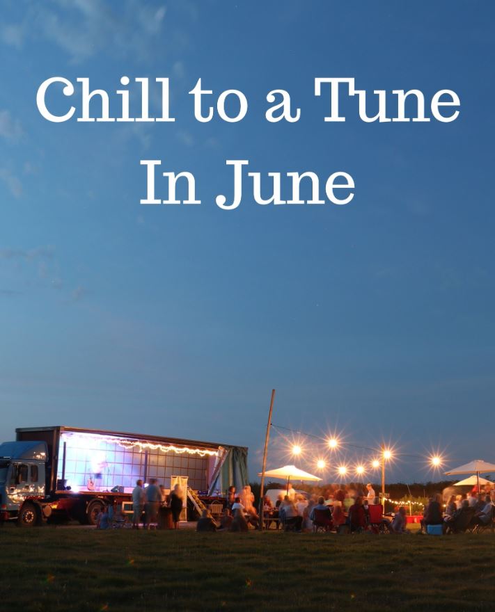 A photograph of lots of people sitting in a field at night under festoon lighting. They are sat next to a lorry that is also a music stage. There is a lot of night sky in the photograph and it says 'Chill to a Tune in June'.